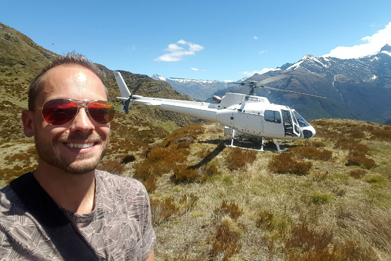 GeoEx Travel Expert Jesse Knight, helicopter, New Zealand