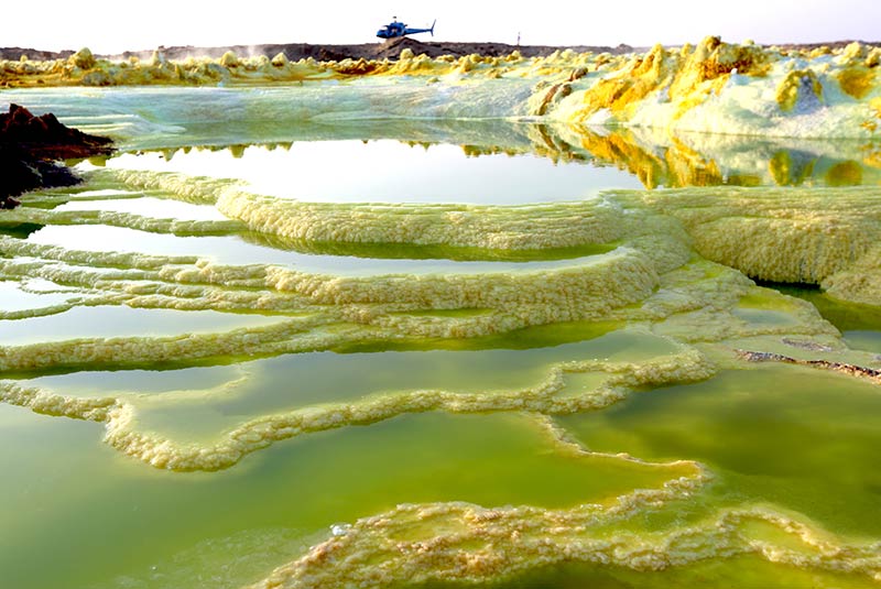 A helicopter near the sulfur pools of the Danakil Depression, Ethiopia