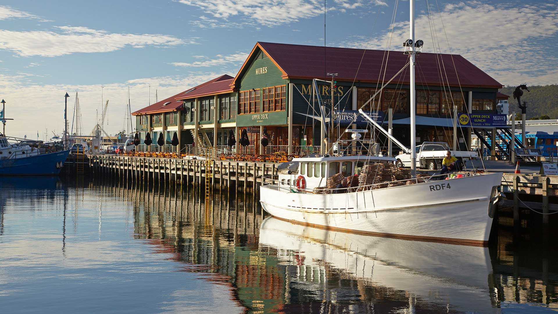 Fishing Boats and Mures Seafood Restaurant, Reflected in Victoria Dock, Hobart, Tasmania, Australia
