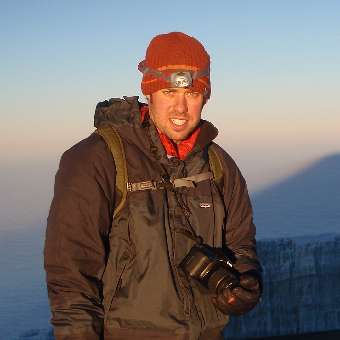 GeoEx CEO Brady Binstadt on the summit of Mount Kilimanjaro, Tanzania