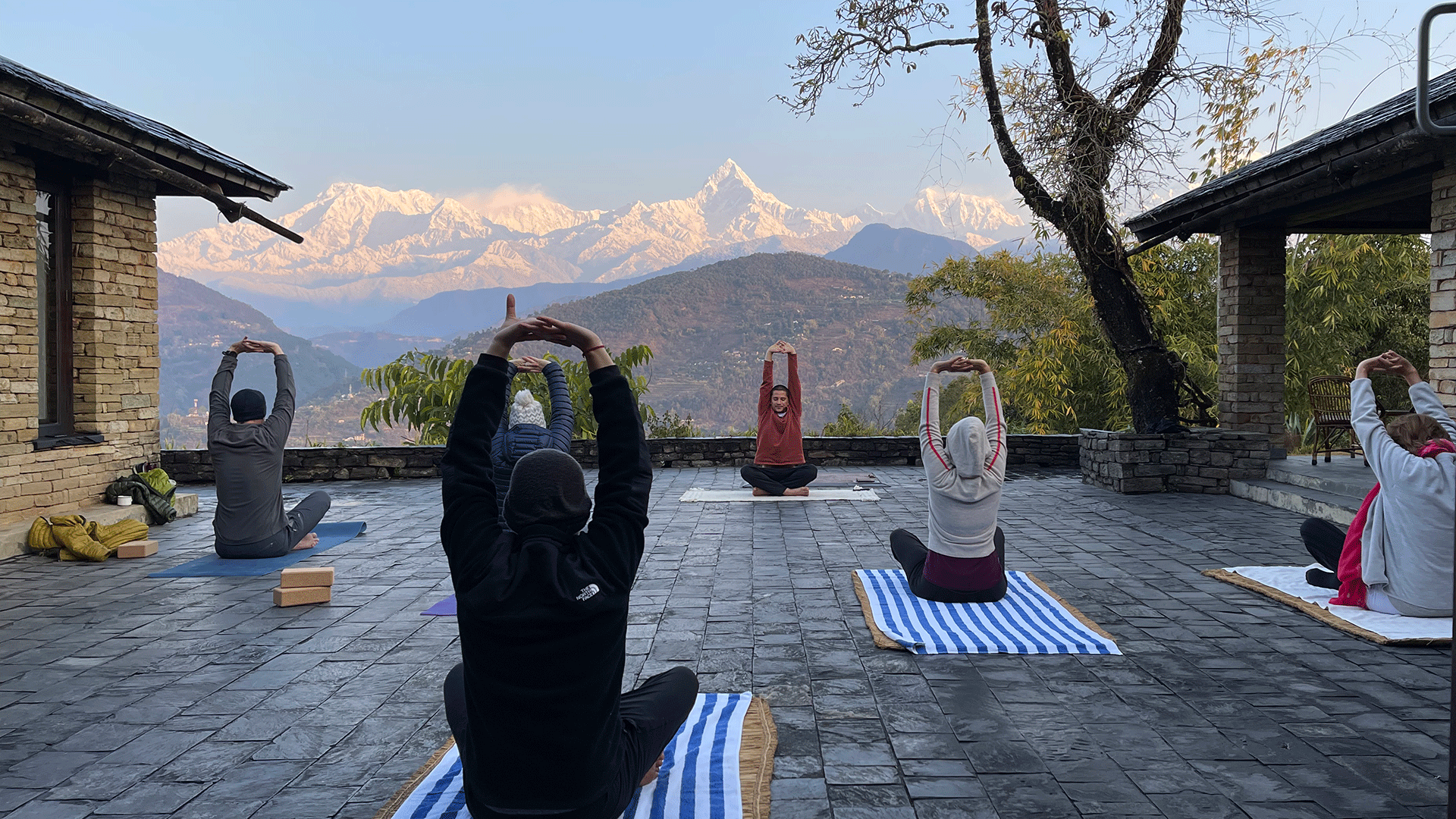 Yoga on the terrace at Tiger Mountain Pokhara Lodge