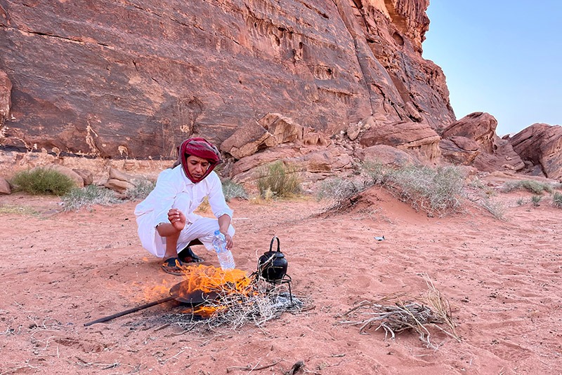 Baking bread in the desert of Wadi Rum, Jordan